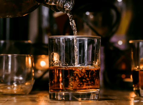 Drink being poured into a glass