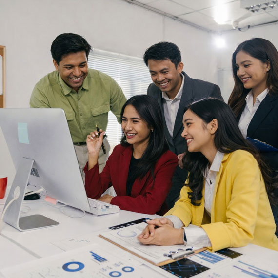 Team working together at a computer